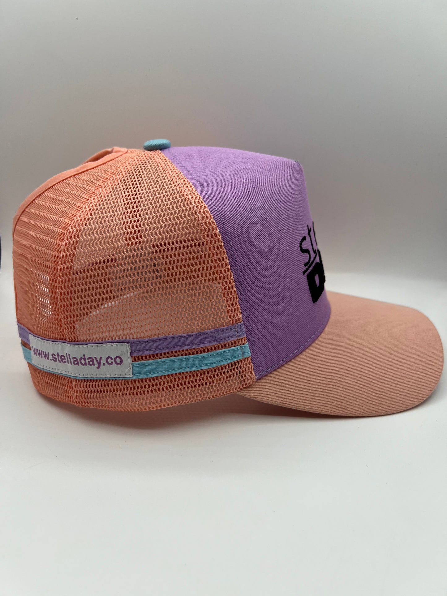 Stella Day Ponytail Trucker Cap
